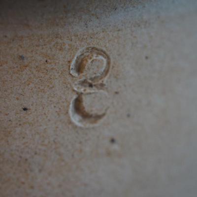 Stoneware handled jug with letter stamp 14"