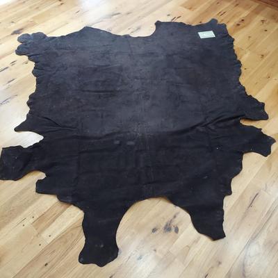 Two Rawhide Area Rugs and Scrap Leather (FR-BBL)