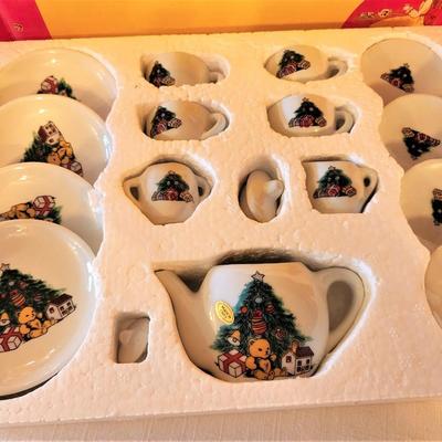 Lot #82  Child's Christmas Miniature Tea set in Box