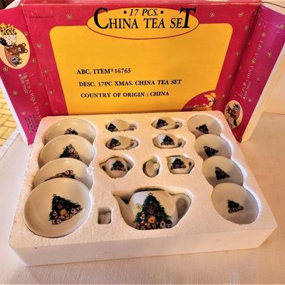Lot #82  Child's Christmas Miniature Tea set in Box