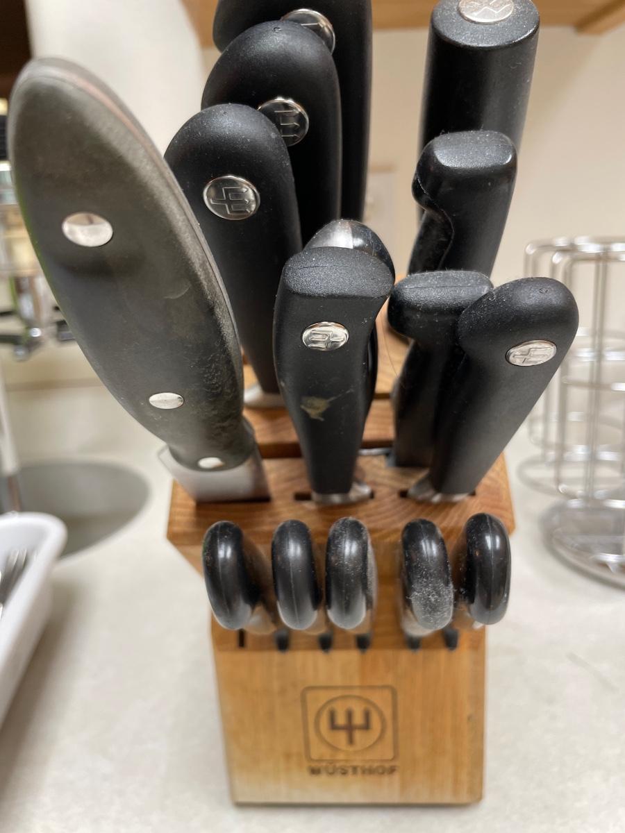 Wusthof knife block and 7 Wusthof knives and sharpener