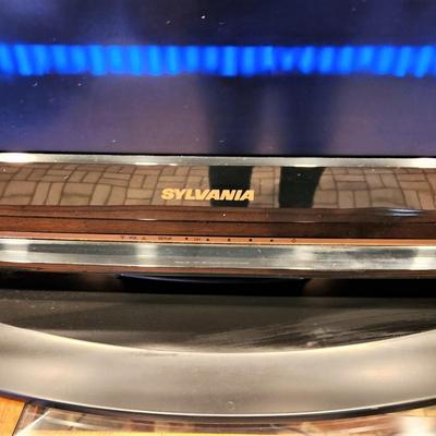 Lot #94  SYLVANIA Flat Screen Tv/DVD Combo - works