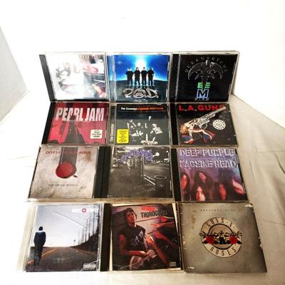 BIG BAND NAMES ON CD-PEARL JAM-CARS-P.O.D-GUNS & ROSES-MORE