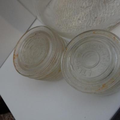 VINTAGE GLASS JUG AND GLASS CANNING LIDS