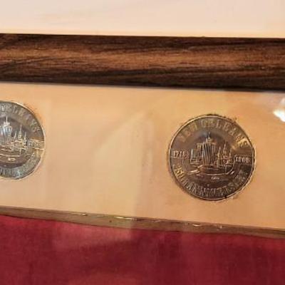 Lot #115  Cloth Confederate Battle Flag framed with Commemorative Doubloons