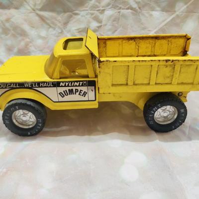 VINTAGE 1978/79 NYLINT DUMPER TRUCK "YOU CALL... WE'LL HAUL"