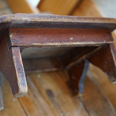 PRIMITIVE GROUPING A HAND CRAFTED STOOL AND HAND MADE SALT BOX OF ORANGE PAINT