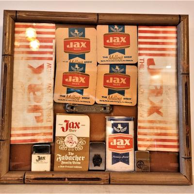 Lot #131  Group of framed JAX BEER Memorabilia - Lighters, Coasters, Note pads