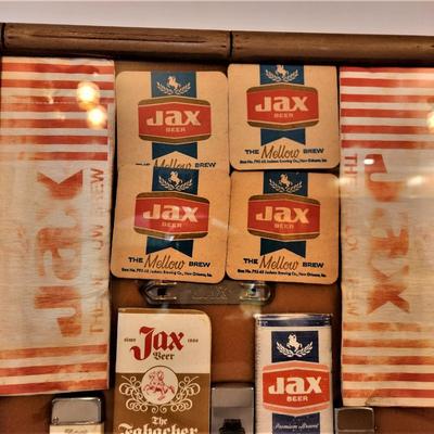 Lot #131  Group of framed JAX BEER Memorabilia - Lighters, Coasters, Note pads