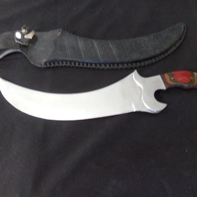 17" CURVED SHEATH KNIFE.