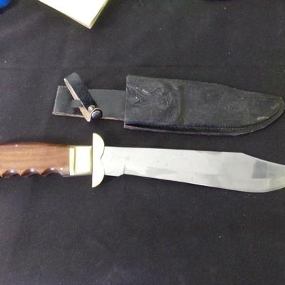 17" FOLDING SHEATH KNIFE. 12" FOLDED. 1" THICK HANDLE.