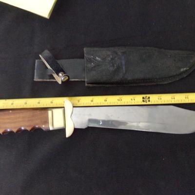17" FOLDING SHEATH KNIFE. 12" FOLDED. 1" THICK HANDLE.
