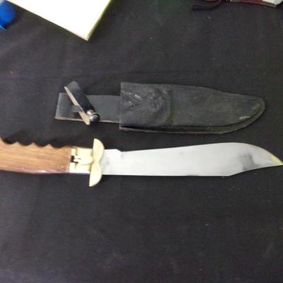 17" FOLDING SHEATH KNIFE. 12" FOLDED. 1" THICK HANDLE.
