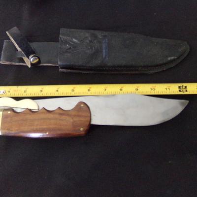 17" FOLDING SHEATH KNIFE. 12" FOLDED. 1" THICK HANDLE.
