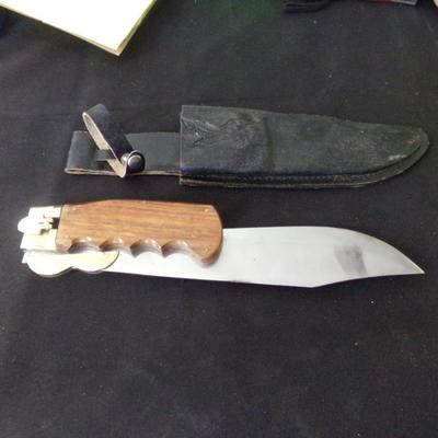 17" FOLDING SHEATH KNIFE. 12" FOLDED. 1" THICK HANDLE.