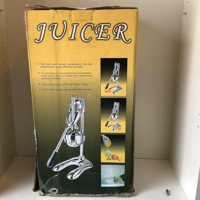 125 New in Box Hand Press Juicer