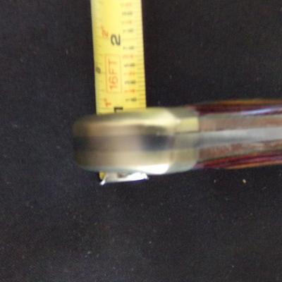 10" SHEATH KNIFE WITH 1" THICK HANDLE.