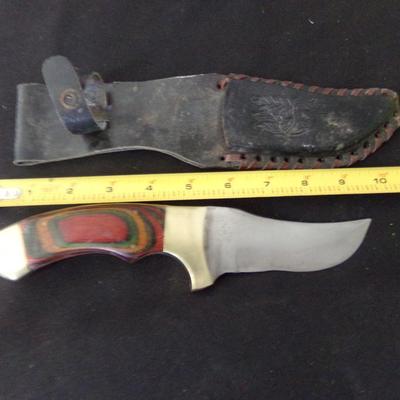 10" SHEATH KNIFE WITH 1" THICK HANDLE.