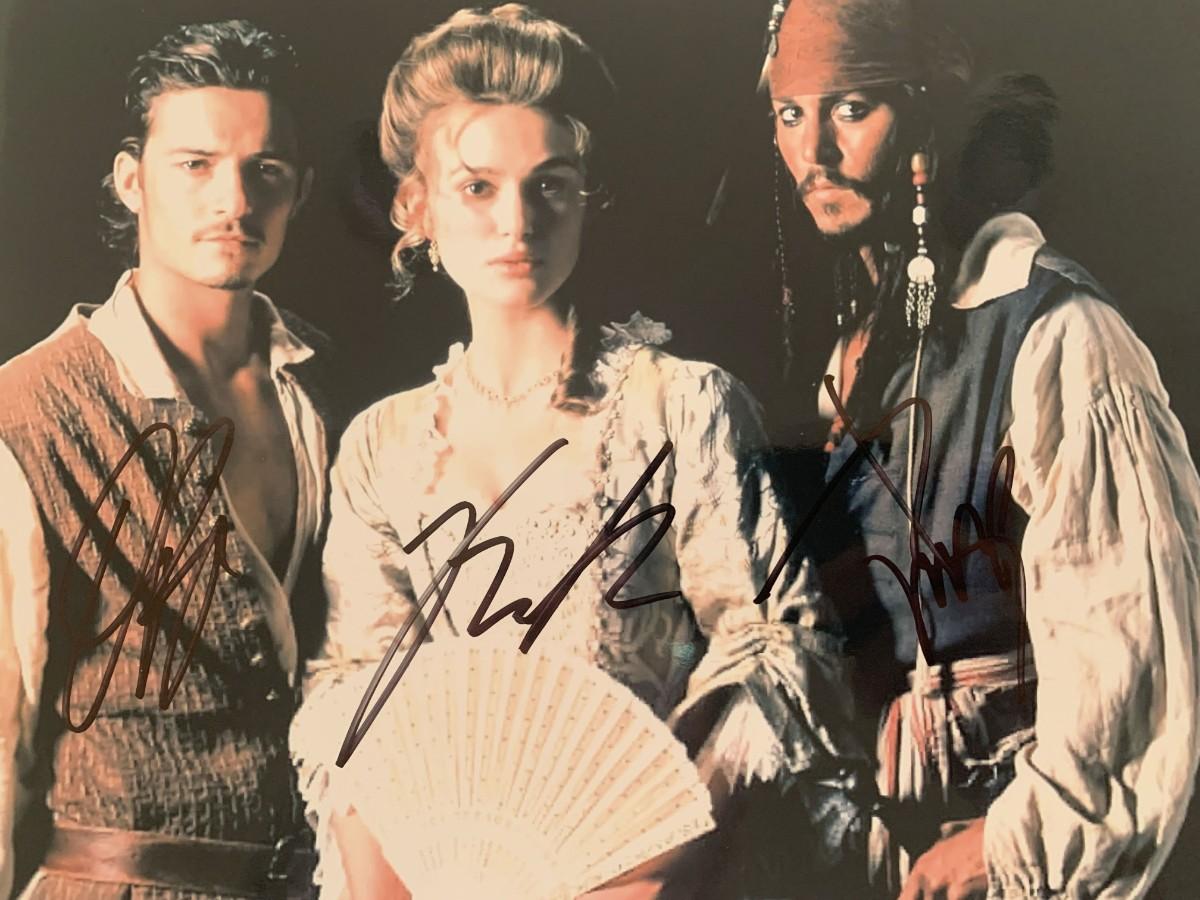 Pirates of the caribbean cast signed photo estatesales