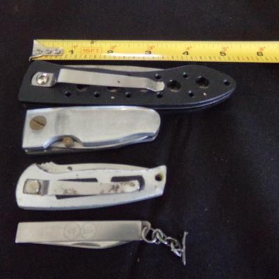2 SHEATH KNIVES AND 4 FOLDING KNIVES.