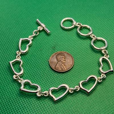 SHINY SILVER TONE HEARTS BRACELET