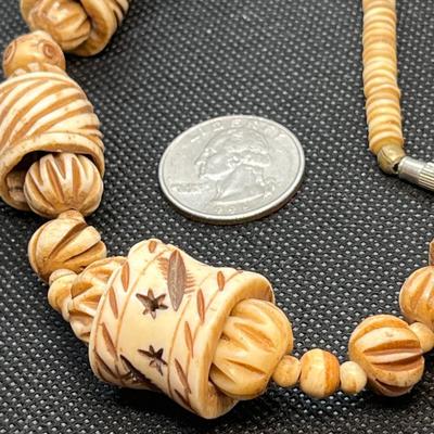 CARVED BONE EXOTIC NECKLACE