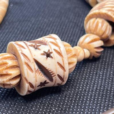 CARVED BONE EXOTIC NECKLACE