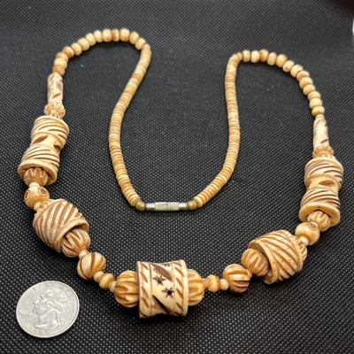 CARVED BONE EXOTIC NECKLACE