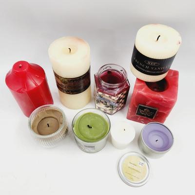 9 SLIGHTLY USED MULTI COLORED CANDLE BUNDLE
