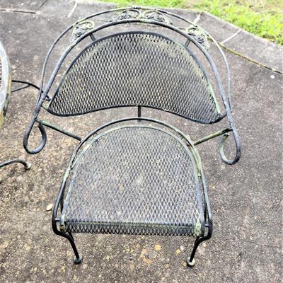 Lot #149  Vintage Cast Iron Patio set - table/4 chairs