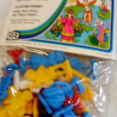 LOT 126   TWO BAGS OF PLASTIC DOLLS OF THE WORLD