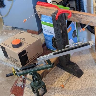 Clay Pigeon Thrower and New Box of Clay Pigeons