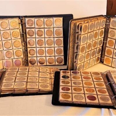 Lot #176  ATTIC FIND - 4 binders of vintage Mardi Gras Doubloons - 1 binder has bronzes