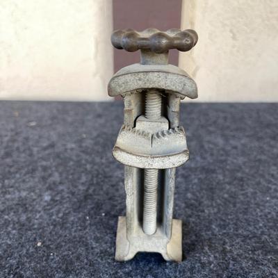 LOT 212 Antique Speedo Cast Iron Jar Opener 6" tall.