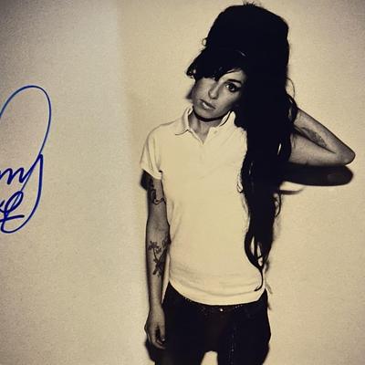 Amy Winehouse signed photo. 8x10 inches 