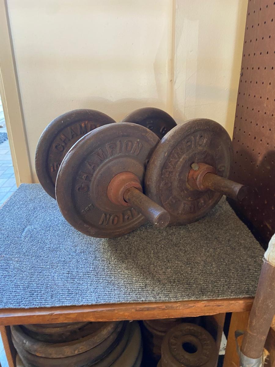 Vintage Adjustable Weight Bench with Multiple Bars Dumbbells