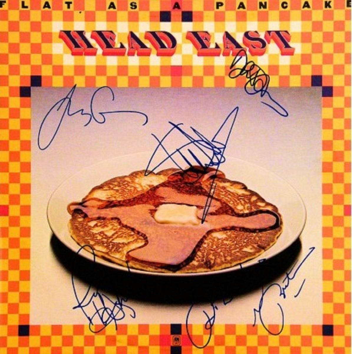 Head East signed Flat As A Pancake album