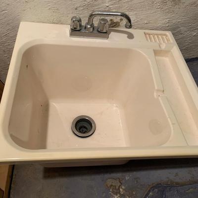 sink w faucet and drain