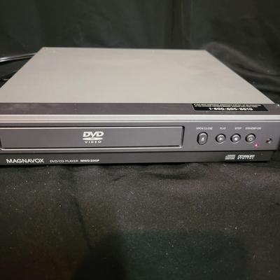 Assortment of CDs and a Magnavox CD/DVD Player (BS-DW)