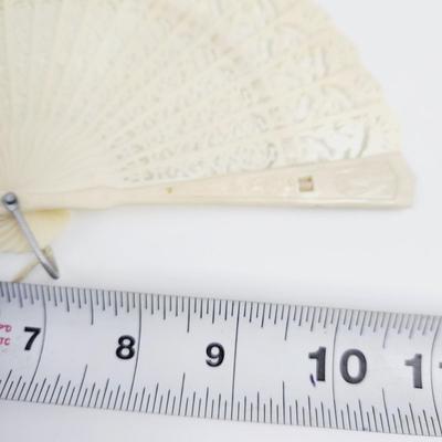 VINTAGE IVORY COLORED PLASTIC? FOLDING FAN