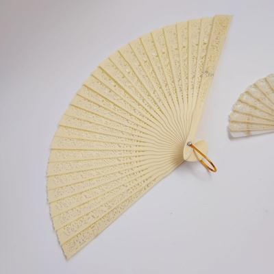 VINTAGE IVORY COLORED PLASTIC? FOLDING FAN