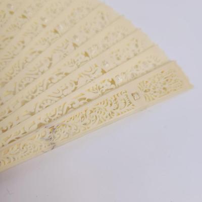 VINTAGE IVORY COLORED PLASTIC? FOLDING FAN