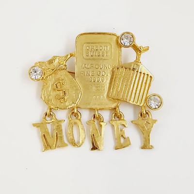 GOLD TONED MONEY BROOCH