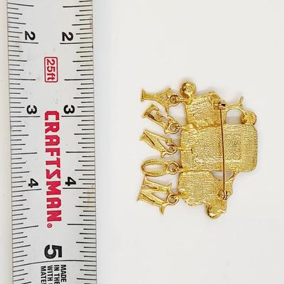 GOLD TONED MONEY BROOCH
