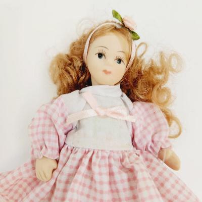 VINTAGE SMALL PORCELAIN DOLL