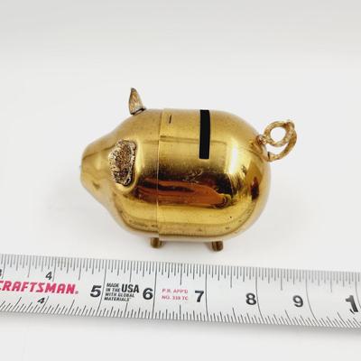 MID-CENTURY BRASS PIGGY BANK
