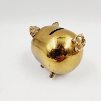 MID-CENTURY BRASS PIGGY BANK