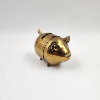 MID-CENTURY BRASS PIGGY BANK