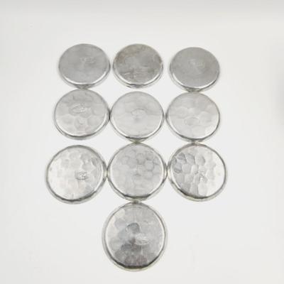 MID-CENTURY EVERLAST FORGED ALUMINUM COASTERS