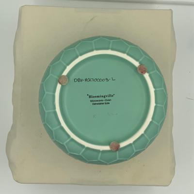 Turquoise bowl with lid